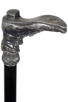 93. Victorian Shoe Cane-Ca. 1875-A very nice example of: 93. Victorian Shoe Cane-Ca. 1875-A very nice example of a silver-plate Victorian shoe cane in fine condition, ebony shaft and a horn ferrule-H. 4” x 3 ½”, O.L. 36 ½”