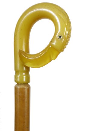 96. Lucite/Bakelite Dress Cane-Ca. 1940-An unusual bird: 96. Lucite/Bakelite Dress Cane-Ca. 1940-An unusual bird with two color plastic eyes, malacca shaft and a horn ferrule-H. 3” x 4”, O.L. 33”