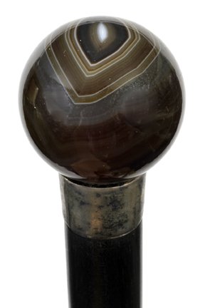 165. Agate Dress Cane-Early 20th Century-A carved agate: 165. Agate Dress Cane-Early 20th Century-A carved agate handle with a beautiful eye affect atop, hallmarked British silver collar, ebony shaft and a horn ferrule-H. 1 5/8” x 1 5/8”, O.L. 37”