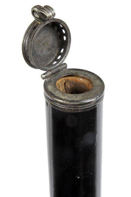 147. Silver Compartment Cane-Ca. 1880-A hinged coin: 147. Silver Compartment Cane-Ca. 1880-A hinged coin silver container cane with pierced sides, probably used for a pomander, unreadable British Hallmarks, ebony shaft and a brass ferrule-H. 1 1/8” x