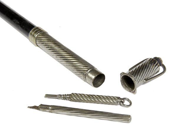163. Fountain Pen System Cane-Late 19th Century-An: 163. Fountain Pen System Cane-Late 19th Century-An interesting silver handle with an ink bottle and cork atop, the top removes and a fountain pen and mechanical pencil are exposed, ebony shaft and a h