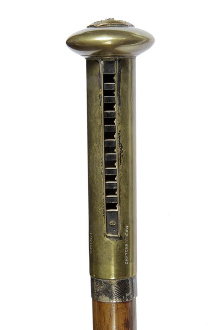171. Harmonica Cane-Ca. 1900-A signed English “Prima”: 171. Harmonica Cane-Ca. 1900-A signed English “Prima” working harmonica cane, brass handle with a sovereign crown atop, silver metal collar with maker’s marks, thick maple shaft and horn ferrule