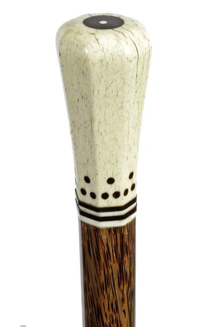 184. Scrimshaw Whalebone Cane-Ca. 1860-An octagonal: 184. Scrimshaw Whalebone Cane-Ca. 1860-An octagonal whalebone handle with a baleen disc inlaid atop, various inlaid baleen spears and rings, cocoanut palm shaft and a bi-metal ferrule, a prime example