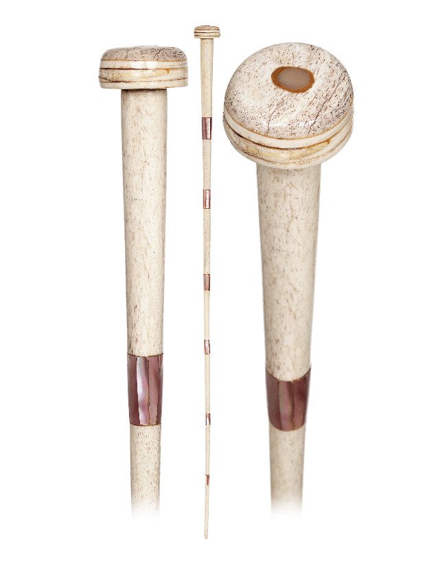 103. Whale Bone and Mother of Pearl Cane-Ca.: 103. Whale Bone and Mother of Pearl Cane-Ca. 1880-Fashioned in a plain and tapering configuration with 7 whale bone segments alternating with 6 flush set joining mother of pearl washers and topped by 