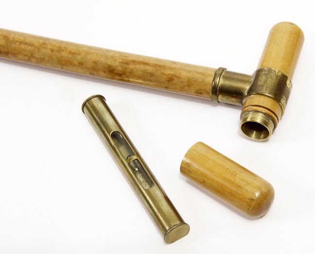 129. Spirit Level Cane- Ca. 1925- Maple container (1 of 2)