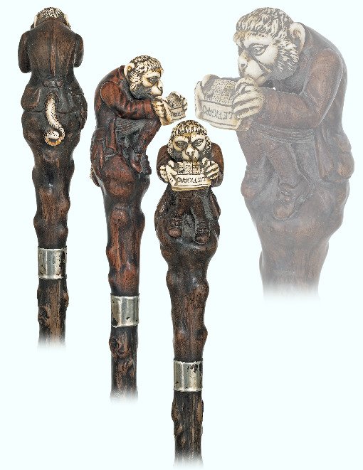 14. Hardwood and Ivory Satirical Humanized-Monkey: 14. Hardwood and Ivory Satirical Humanized-Monkey Cane-Ca. 1880-Sizeable hardwood and ivory handle carved to depict a gentleman monkey reading the famous Parisian newspaper “le Figaro”, knobby kon