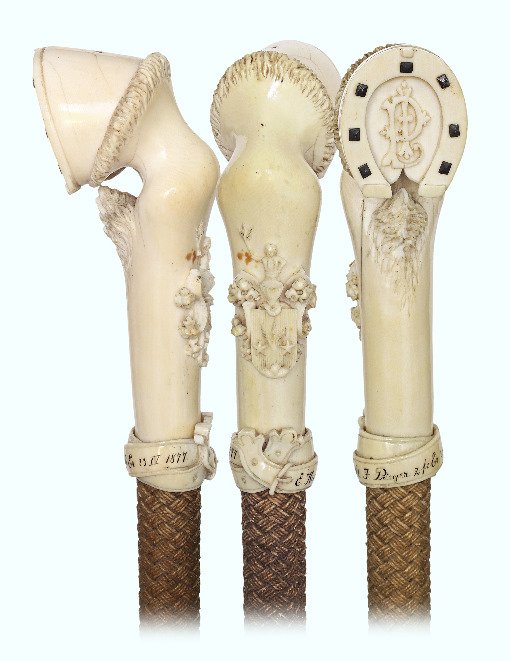 54. Ivory Equestrian Whip Cane-Dated 23. IV.: 54. Ivory Equestrian Cane-Dated 23. IV. 1877-Substantial and masterly carved ivory horse leg and hoof handle on a flexible shaft totally covered with braided cords in a repeating four wire pattern. Th