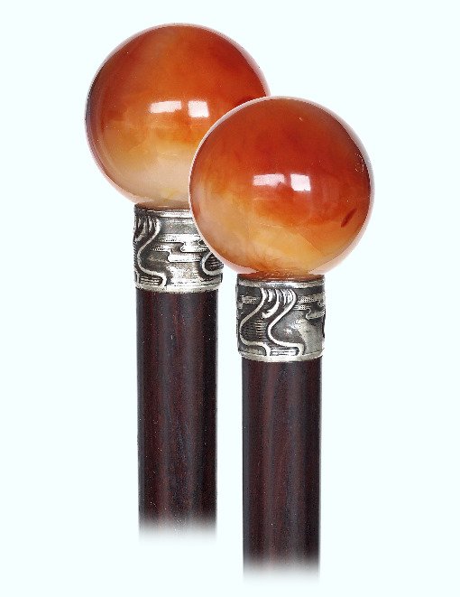 61. Hard Stone Dress Cane-Ca. 1900-Carnelian ball knob: 61. Hard Stone Dress Cane-Ca. 1900-Carnelian ball knob of a captivating red-orange color and glassy translucent structure that brings to mind the fire of a sunset, close pored rosewood shaft with an A