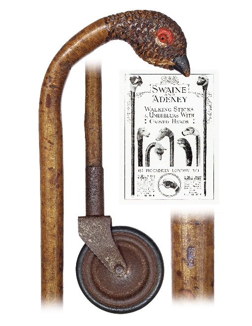 120. Brigg Dual-Purpose Wheeled Cane-Ca. 1910-Wild life: 120. Brigg Dual-Purpose Wheeled Cane-Ca. 1910-Wild life day cane fashioned of a very tall and well-dressed golden hazel branch with an integral crook handle ending with a natural bough carved as a phe