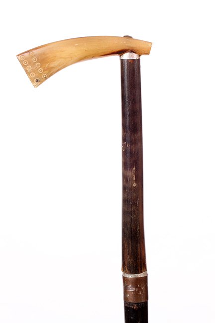 3. Horn Sword Cane- Ca. 1900- A European horn handle,: 3. Horn Sword Cane- Ca. 1900- A European horn handle, two silver metal collars, hardwood shaft, 2 ½” brass ferrule, two sided 14” blade with push pull mechanism. H- 5 ½” x 1 ½” O.L.- 36” 