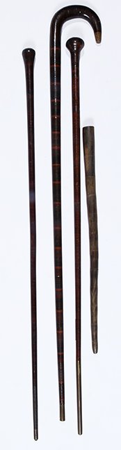 107. Four Bludgeon Canes- Ca. 1880-1920- Three full: 107. Four Bludgeon Canes- Ca. 1880-1920- Three full length stacked leather bludgeon canes and a horn swagger stick. $250-$400.