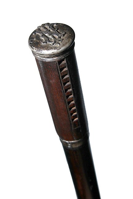 6. Harmonica Cane- Late 19th Century- A working wooden: 6. Harmonica Cane- Late 19th Century- A working wooden harmonica cane with a silver disc atop which is monogrammed, silver collar, thick ebony shaft and a brass ferrule. H.- 5 ¼ x 1 ¾” O.L.- 36 ½