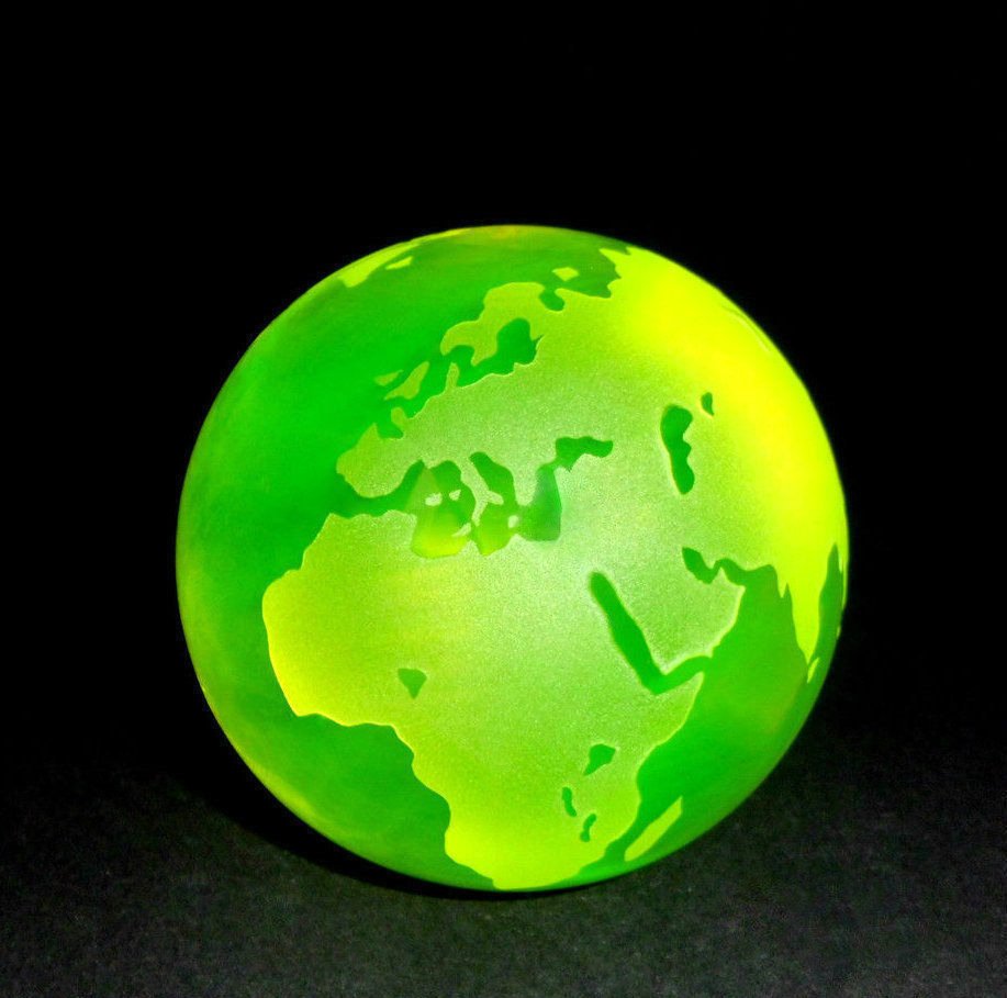 CZECH YELLOW URANIUM VASELINE ART GLASS GLOBE PAPERWEIG: CZECH YELLOW URANIUM VASELINE Glass Ball PAPERWEIGHT Hand made art work paperweight. Smooth Globe Sphere with facet on the bottom for better stability. Made of bright yellow translucent glass. Dyed wi