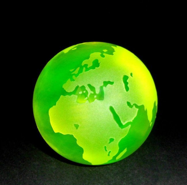 CZECH YELLOW URANIUM VASELINE ART GLASS GLOBE PAPERWEIG: CZECH YELLOW URANIUM VASELINE Glass Ball PAPERWEIGHT Hand made art work paperweight. Smooth Globe Sphere with facet on the bottom for better stability. Made of bright yellow translucent glass. Dyed wi
