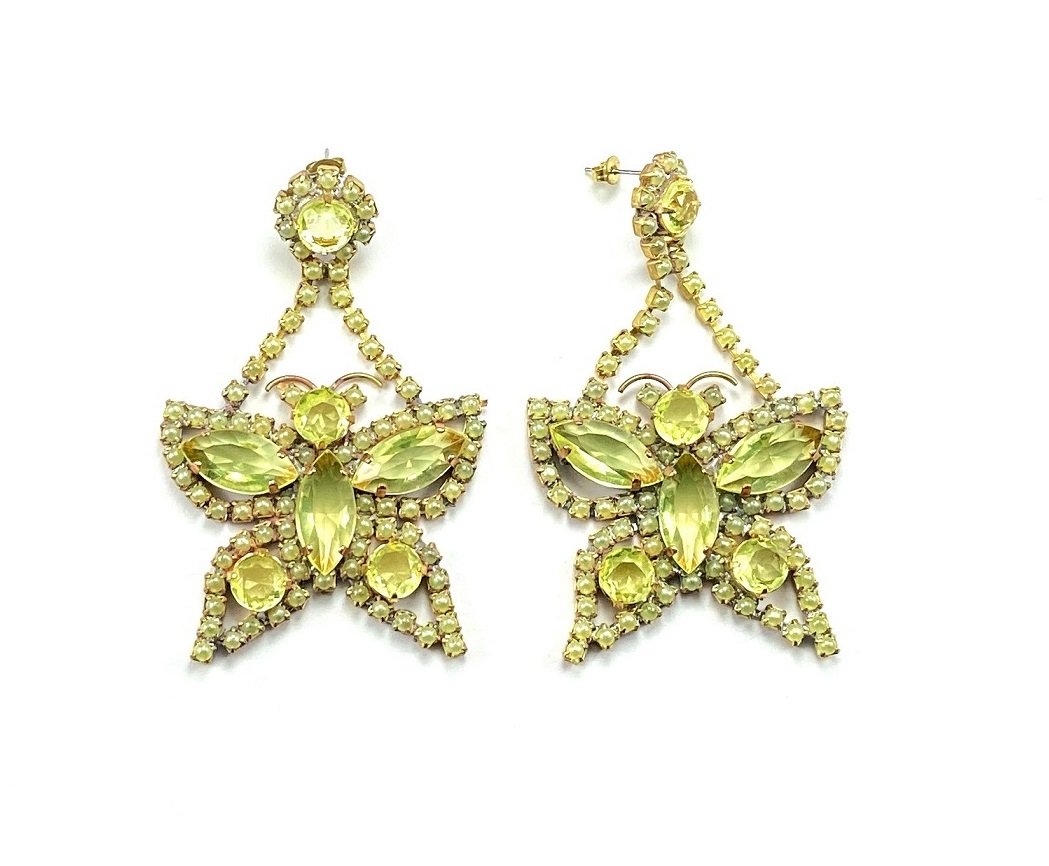 Art Deco Vaseline Uranium Glass Vintage Stud Earrings Butterflies: Beautiful design. Made in Czechoslovakia 1950-1980. All the stones in these Earrings are from uranium glass. Really nice piece that glows beautifully under UV light. Excellent condition. No missing st