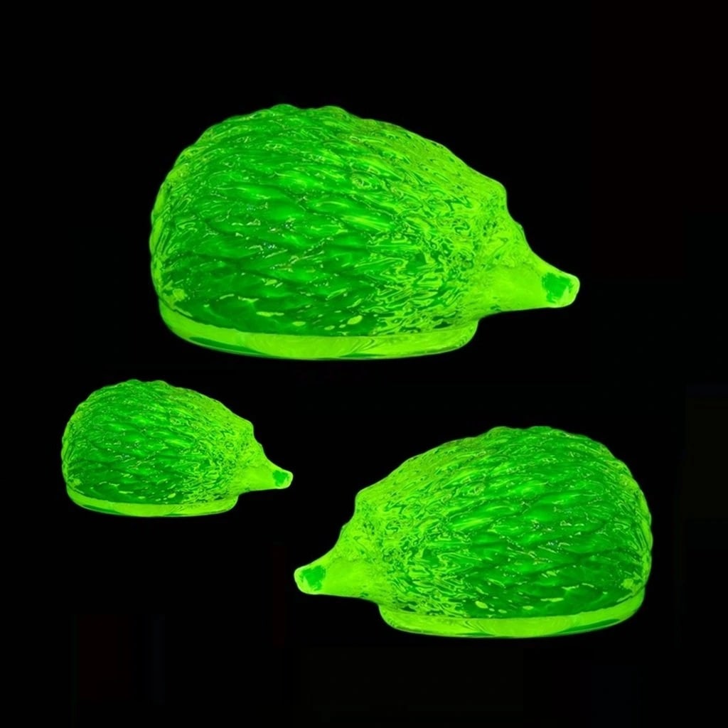 Bohemian Uranium Glass Hedgehog Family, Set of 3: Bohemian Uranium Glass. Very beautiful decoration to your house or office. A really beautiful piece that glows beautifully under UV light. Dimensions: Length 3 in ( 7,5 cm ), Length 2 1/2'' ( 6.5 cm )