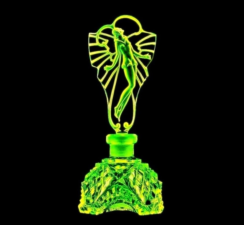 Art Deco Uranium Glass Bohemian Perfume Bottle 1930' H.Hoffmann: Art Deco Bohemian Uranium Glass Perfume Bottle. A beautiful Bohemian piece that glows wonderfully under UV light. This elegant perfume bottle features classic Art Deco design and vibrant uranium glass