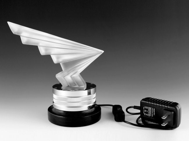 Automotive collectors item - illuminated Base + Art Deco Glass Hood Ornament: This piece is a great addition to collection or a great gift.Illuminated Stainless Steel Base + Art Deco Bohemian Glass Hood Ornament + Wood Pedestal. This item is a great addition for your home, offi