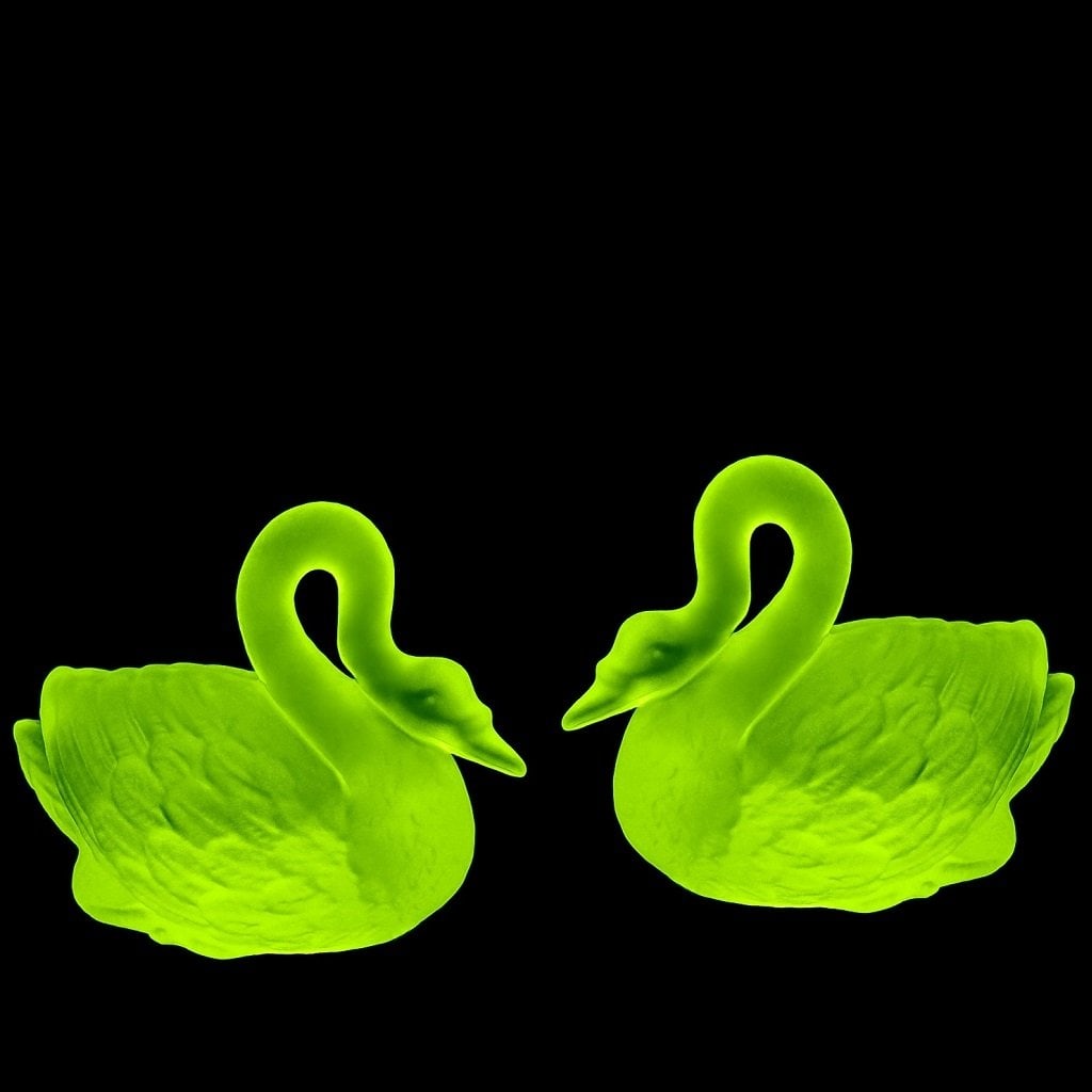 Art Deco Vaseline Uranium Glass 'Swans' Figurines (Set of 2) 1930' H.Hoffmann: These pieces is a great addition to a collection, or a great gift. These pieces were made in Bohemia using ORIGINAL antique molds from the 1930s. They display a gentle green glow when placed under UV 