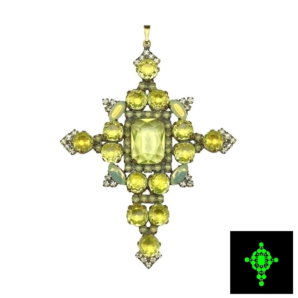 Art Deco Uranium Glass Cross Pendant: A really nice piece that glows beautifully under UV light. All the stones in this pendant are made of antique uranium glass. Made in Czechoslovakia. Dimensions: Height: 3 1/2 '', Width: 2 3/4 ''