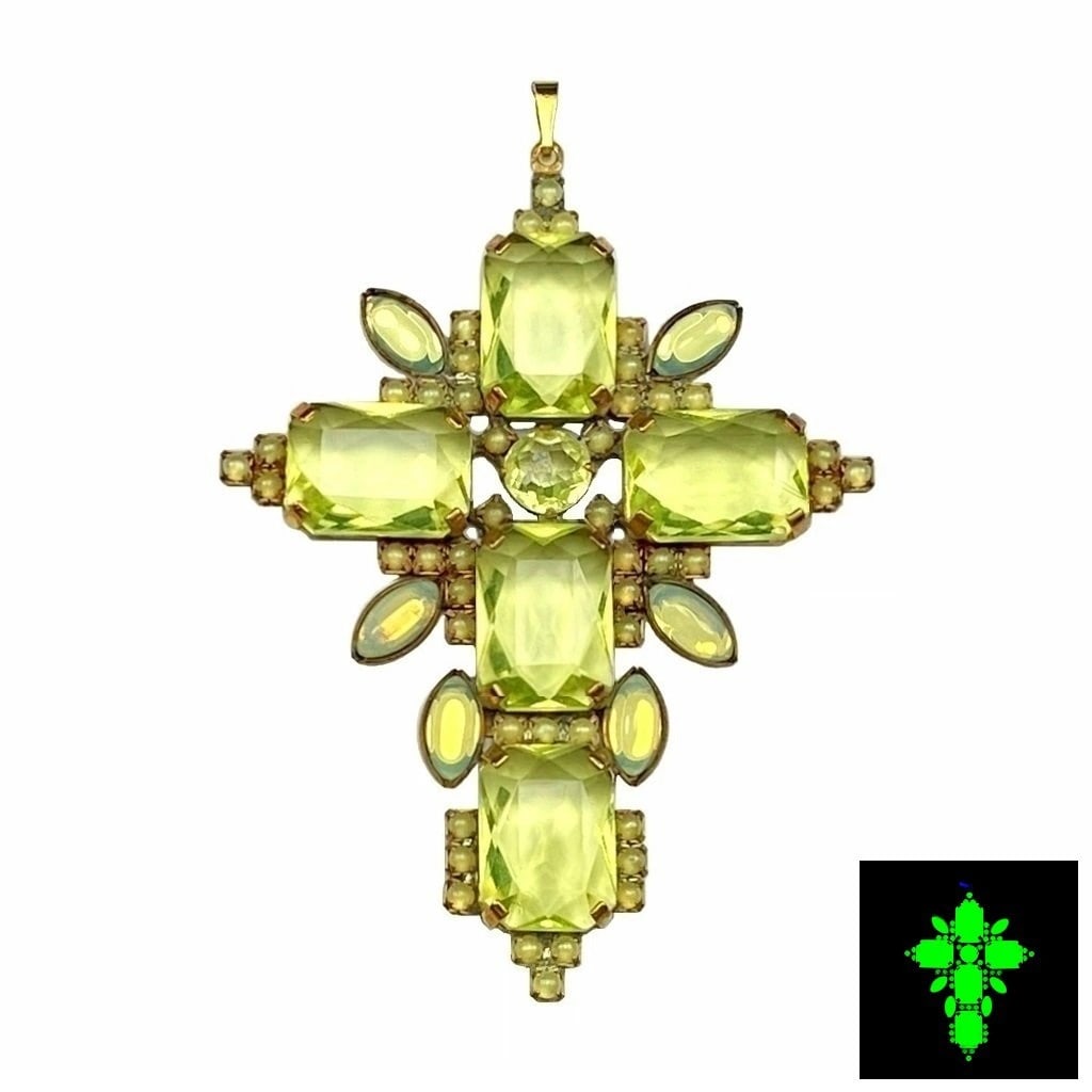 Art Deco Uranium Glass Cross Pendant: A really nice piece that glows beautifully under UV light. All the stones in this pendant are made of antique uranium glass. Made in Czechoslovakia. Dimensions: Height: 3 1/4 '', Width: 2 1/2 ''