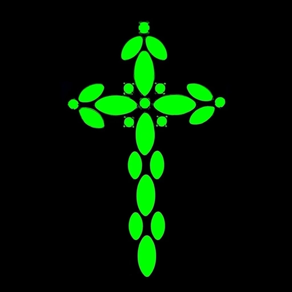 Art Deco Uranium Glass Cross Pendant: A really nice piece that glows beautifully under UV light. All the stones in this pendant are made of antique uranium glass. Made in Czechoslovakia. Height: 4 '', Width: 2 1/4 ''
