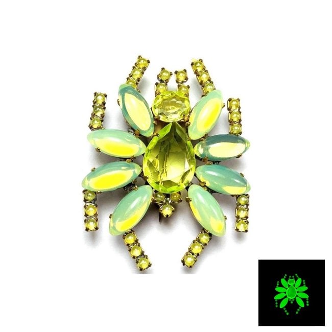 Vintage Vaseline Uranium Glass Vintage Brooch Pin: Really nice piece that glows beautifully under UV light. All the stones in this brooch are from uranium glass. Made in Czechoslovakia. Dimensions: Height: 2 1/4 '', Width: 1 3/4 ''. Fast delivery time