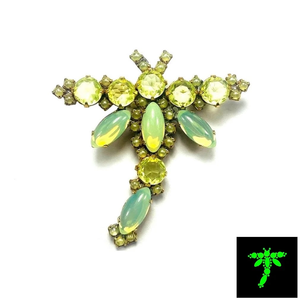 Vintage Vaseline Uranium Glass Vintage Brooch Pin: Really nice piece that glows beautifully under UV light. All the stones in this brooch are from uranium glass. Made in Czechoslovakia. Dimensions: Height: 2 1/2 '', Width: 2 1/4 ''. Fast delivery time