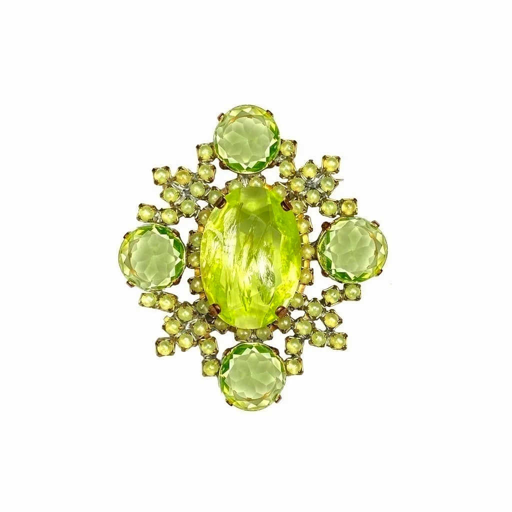 Vintage Vaseline Uranium Glass Vintage Brooch Pin: Really nice piece that glows beautifully under UV light. All the stones in this brooch are from uranium glass. Made in Czechoslovakia. Dimensions: Height: 2 1/4 '', Width: 2 ''. Fast delivery time wor