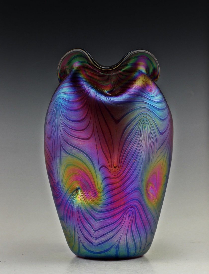 Amazing Bohemian Loetz Style Iridescent Vase: Extraordinary beautiful piece of the finest quality glass hand made in the Bohemian region of the Czech Republic in the style of Art Noveau or Art Deco.The vase is 8" ( 21 cm ) tall and approximately
