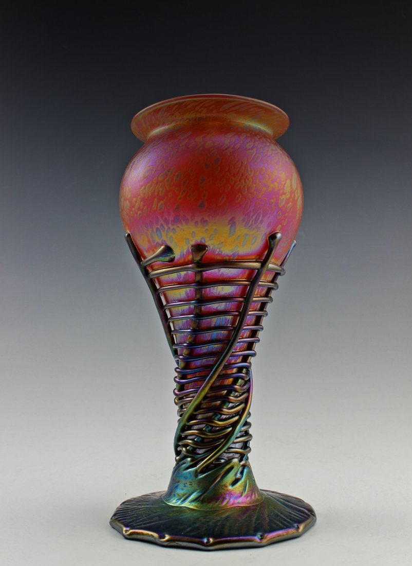 Amazing Bohemian Loetz Style Iridescent Vase: Extraordinary beautiful piece of the finest quality glass hand made in the Bohemian region of the Czech Republic in the style of Art Noveau or Art Deco.The vase is 8" ( 21 cm ) tall and approximately