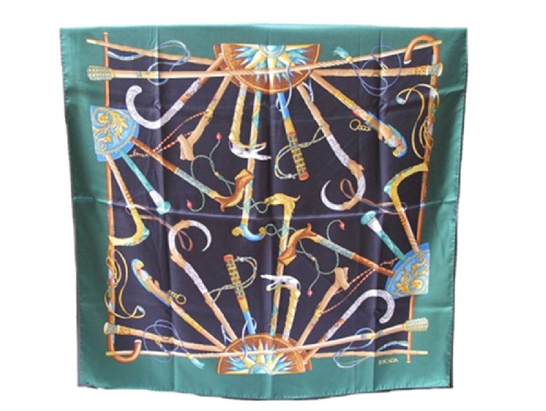 Escada Vintage Green Canes Silk Scarf: This beautiful Vintage Escada scarf is in excellent condition. The gorgeous screen printed silk pattern reflects a colorful array of different styles of embellished walking canes. The fabulous colorin