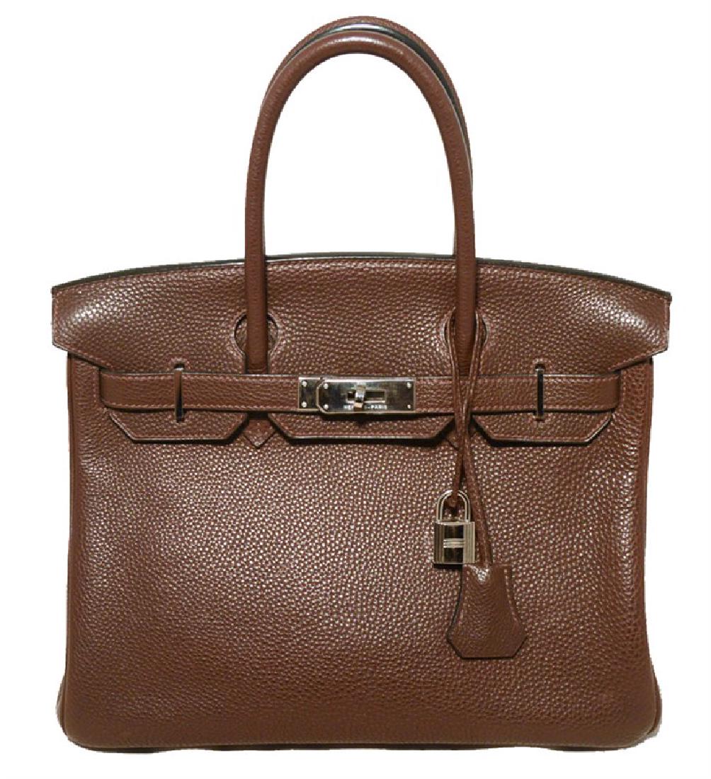 Hermes Brown Cacao Clemence Leather 30cm Birkin Bag: Authentic Hermes 30cm brown clemence leather birkin bag in very good condition. Chocoloate brown clemence leather exterior trimmed with shining silver palladium hardware. Twist double strap closure op