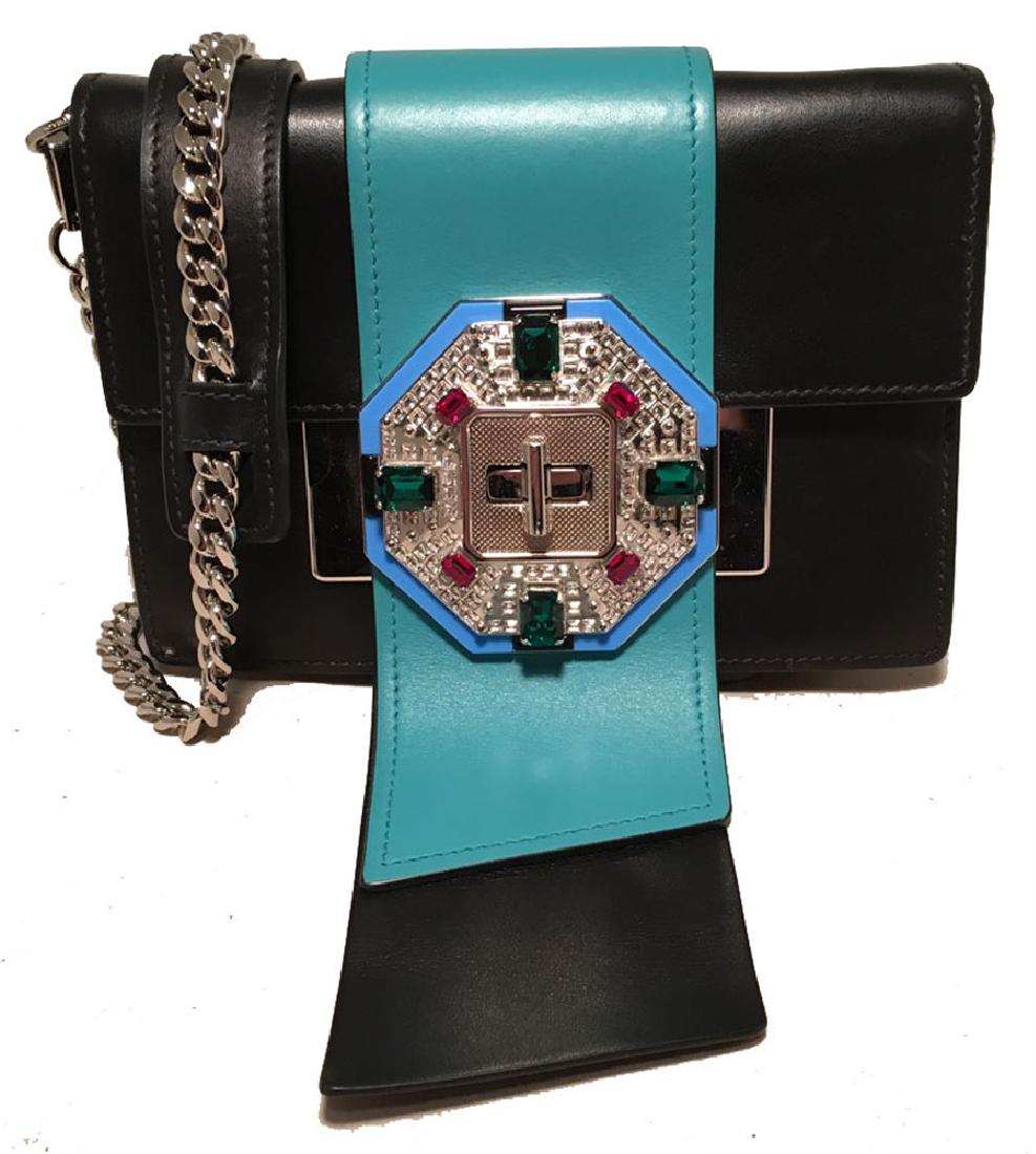 Prada Black and Teal Leather Jeweled Front Shoulder Bag: Prada Black and Teal Leather Jeweled Front Shoulder Bag Clutch in excellent condition. Black leather exterior trimmed with silver hardware and a black and teal leather strip bejeweled front closure. T