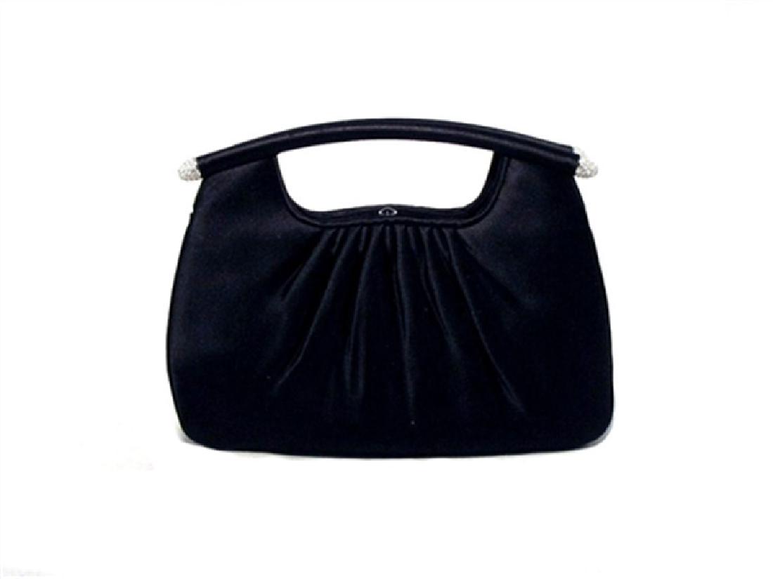 Judith Leiber Black Satin Evening Bag: This beautiful Judith Leiber piece is in excellent condition. The exterior features stunning black satin trimmed with clear swarovski crystals along the handle ends. The push button hinged closure ope