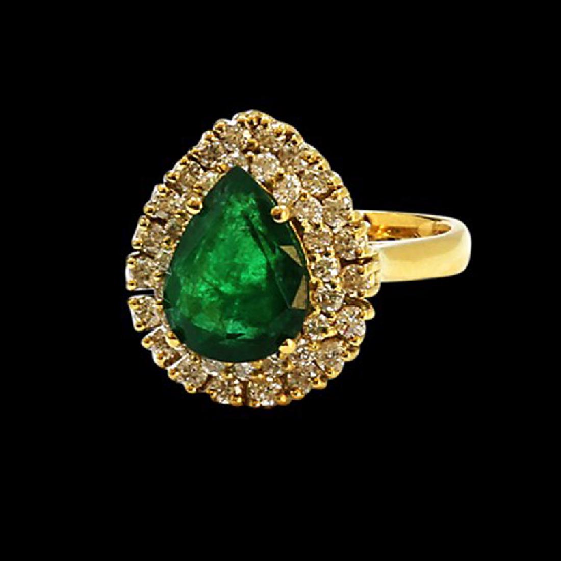 3.02CT NATURAL COLOMBIAN EMERALD 14K YELLOW GOLD RING: 14K YELLOW GOLD NATURAL COLOMBIAN EMERALD RING:6.58 GRAMS/DIAMOND:0.84CT/EMERALD:3.02CT/#GVR1112 **This 3.02ct Pear Shape Natural Emerald catches the light and gleams like rolling hills of fresh green