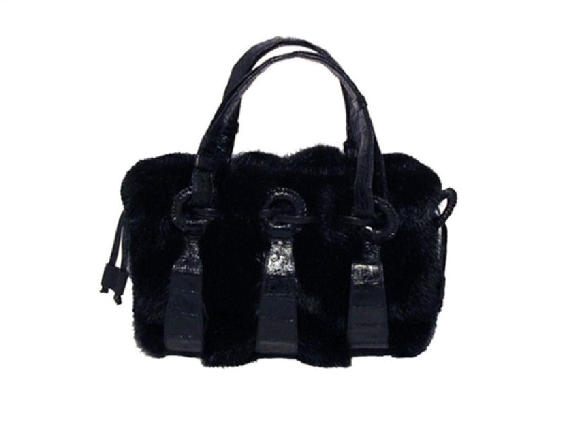 Nancy Gonzalez Black Mink & Crocodile Handbag: This stunning Nancy Gonzalez creation is in excellent condition. The exterior features beautiful black mink fur trimmed with black crocodile leather and double handle straps. The interior is lined wit