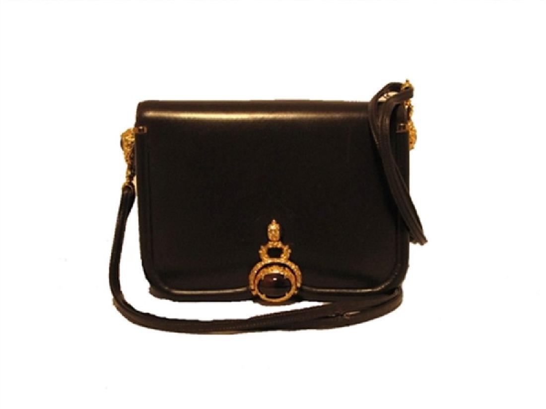 Judith Leiber Tiger Eye Mini Shoulder Bag: This exquisite Judith Leiber creation is in excellent condition. The exterior features gorgeous chocolate brown leather trimmed with gold hardware and a wonderful tigers eye stone on the front flap. T