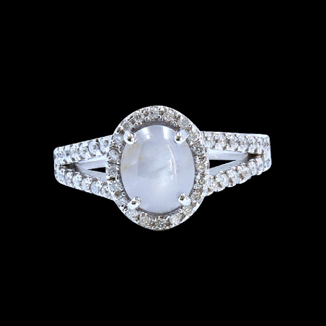 2.19ct Ceylon Star Sapphire 18K White Gold Ring: 18K W/G CEYLON STAR SAPPHIRE RING: 3.99GRAM / CEYLON STAR SAPPHIRE :2.19CT / DIA: 0.41CT / /#GVR1354