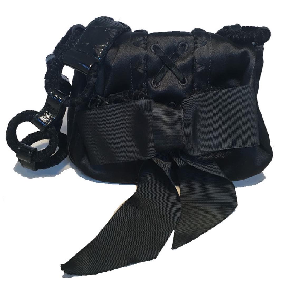 Yves Saint Laurent YSL Black Silk Satin Ribbon Bow: ADORABLE YSL black silk ribbon evening bag in excellent condition. Black silk exterior trimmed with a black lace up design along the top front flap, circled velvet covered shoulder strap and a black b