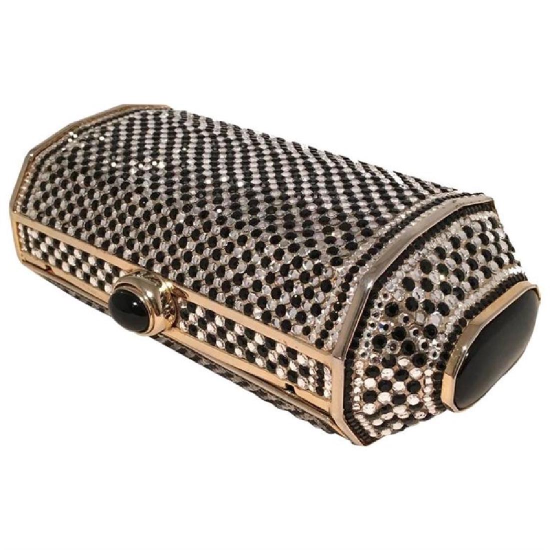 Judith Leiber Black and White Swarovski Crystal: GORGEOUS Vintage Judith Leiber minaudiere in excellent condition. Black and white swarovski crystal exterior over a gold frame. Top button closure opens to a gold leather lined interior that holds an