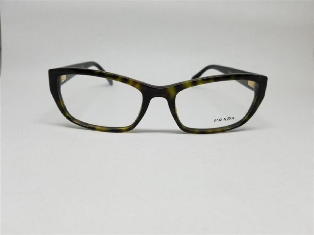 Prada Glasses Frames / ( P1260BG2N1): Prada Glasses Frames / ( P1260BG2N1) Brand : Prada Serial : BP21833421 Condition : Brand New ( JUST DISPALY , Small scratch ) SIze : 54 ? 18 VPR 180 2AU-101 135 Come With : Plastic zipper bag , Gla