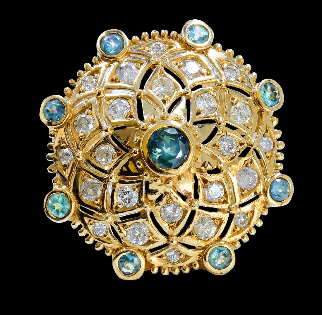 1.17CT NATURAL ALEXANDRITE 14K YELLOW GOLD RING: 14K YELLOW GOLD NATURAL ALEXANDRITE RING:8.83 GRAMS/DIAMOND:1.06CT/ALEXANDRITE:1.17CT/#GVR1002 **Crafted in warm 14k yellow gold, this elegant display of sparkling, rare 1.17ct round cut natural turqu