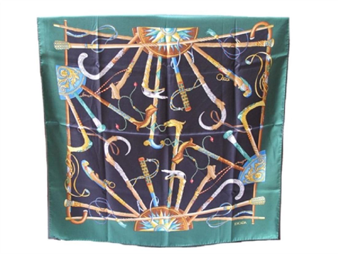 Escada Vintage Green Canes Silk Scarf: This beautiful Vintage Escada scarf is in excellent condition. The gorgeous screen printed silk pattern reflects a colorful array of different styles of embellished walking canes. The fabulous colorin