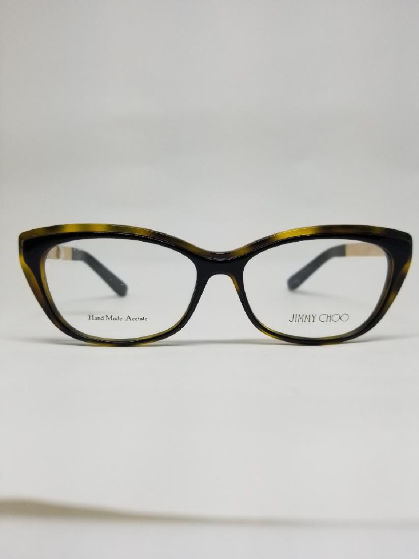 JIMMY CHOO Glasses Frames - / (P1589JG215N7): JIMMY CHOO Glasses Frames - / (P1589JG215N7) Brand :JIMMY CHOO Serial : JC126 Condition : Brand New SIze : 244 140 Come With : Plastic zipper bag , Glasses #RK301