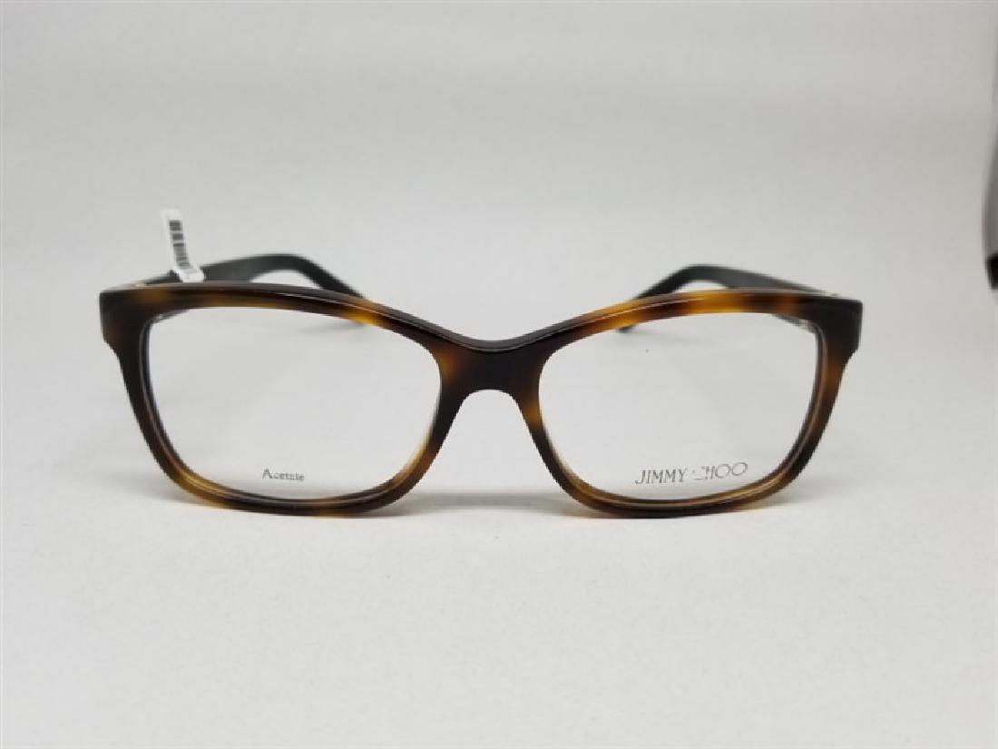 JIMMY CHOO Glasses Frames / ( P1589JG215N20): JIMMY CHOO Glasses Frames / ( P1589JG215N20) Brand : JIMMY CHOO Serial : JC 129 Condition : Brand New SIze : 112 135 Come With : Plastic zipper bag , Glasses #RK219