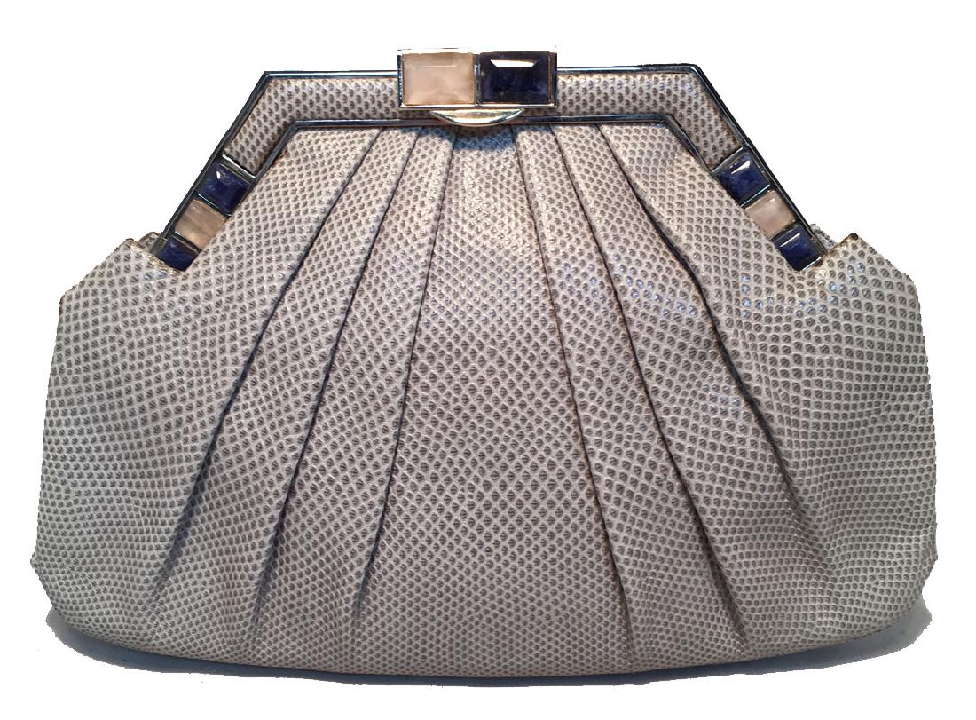Judith Leiber Grey Lizard Stone Top Clutch: Beautiful Judith Leiber Grey Lizard Stone Top Clutch in very good condition. Grey lizard leather exterior trimmed with silver hardware and lapis and rose quartz stones along top edge. Lifting top hing