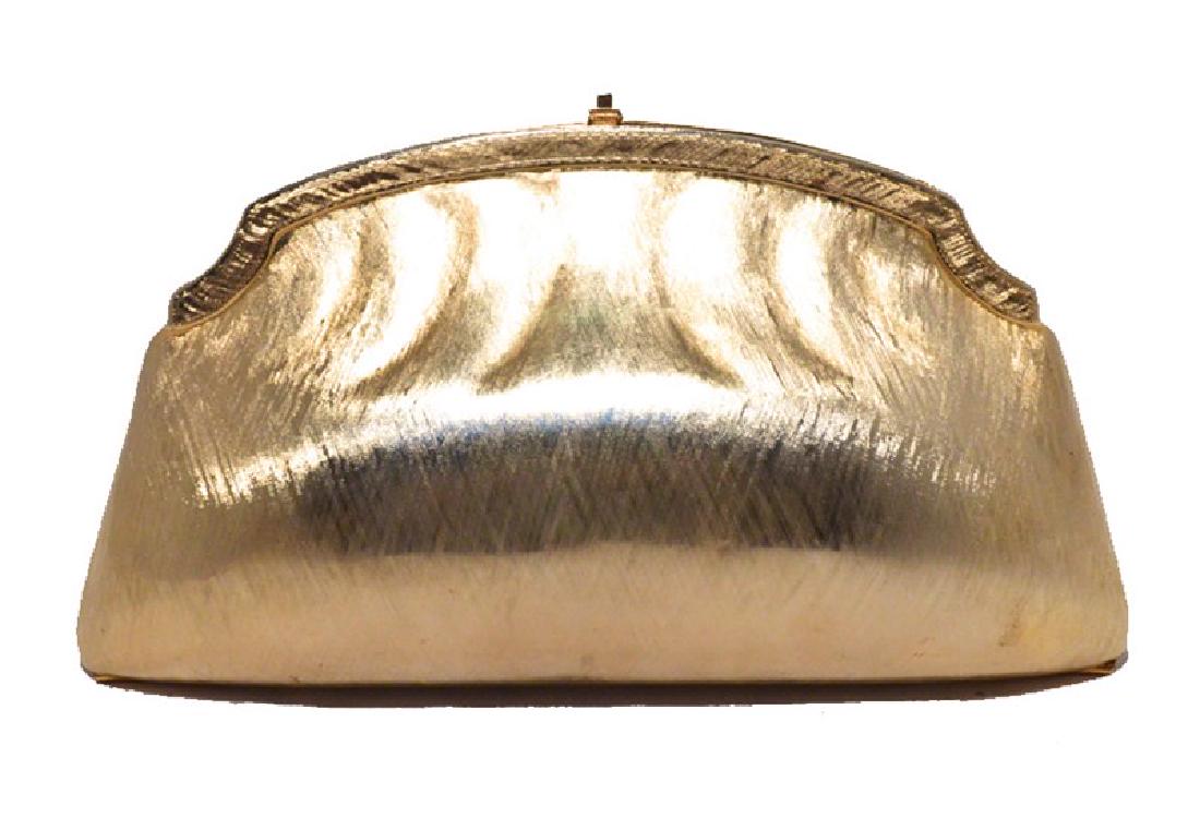 Judith Leiber Gold Evening Bag Clutch: GORGEOUS vintage Judith Leiber gold evening bag clutch in excellent condition. Â Brushed gold exterior with a top push button closure. Â Gold leather lined interior that holds a hidden attached go