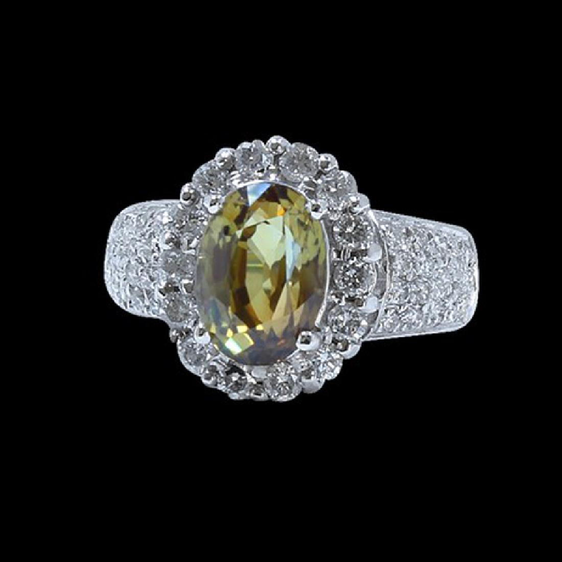 3.17CT NATURAL ALEXANDRITE 18K WHITE GOLD RING: 18K WHITE GOLD NATURAL ALEXANDRITE RING:6.82 GRAMS/DIAMOND:0.97CT/ALEXANDRITE:3.17CT/#GVR1106 **This spectacular 3.17ct Oval Cut Natural Alexandrite casts a vibrant golden hue. Alexandrite is known as