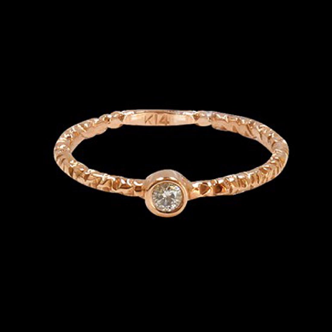0.06CT NATURAL DIAMOND 14K ROSE GOLD RING: 14K ROSE GOLD NATURAL DIAMOND RING:1.58 GRAMS/DIAMOND:0.06CT//#GVR1086 **Warmly crafted in 14k rose gold, this 0.06ct Round Brilliant Cut Bezel Setting Diamond Solitaire sparkles dynamically. A stone 